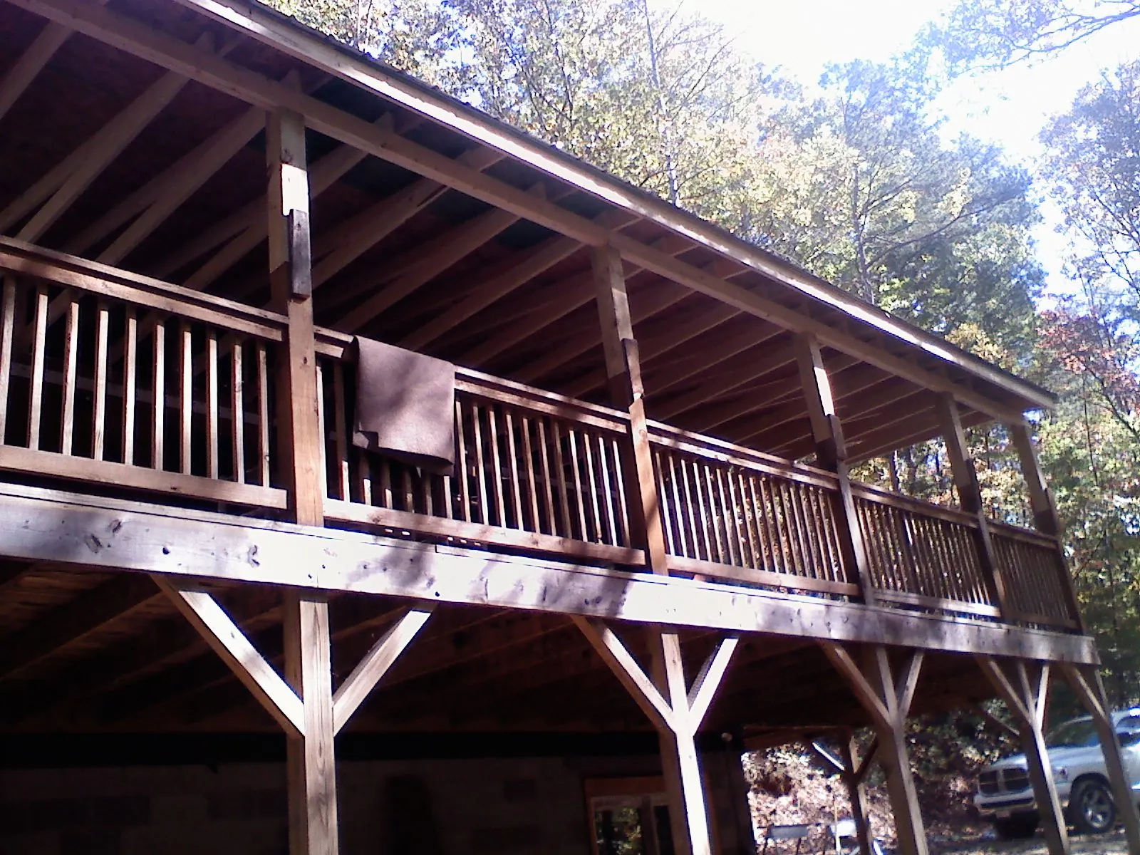 Timber framing under a new elevated porch and deck — Roof Leak Repair in Sully by Roofing Brothers